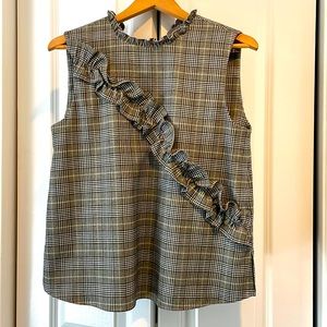 Black and White Plaid sleeveless top with ruffle details.